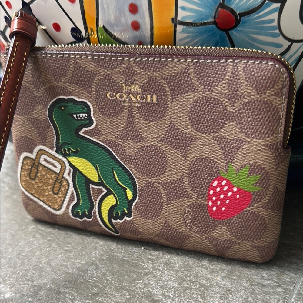 Coach Brown Wristlet with Dinosaur and Strawberry Patches